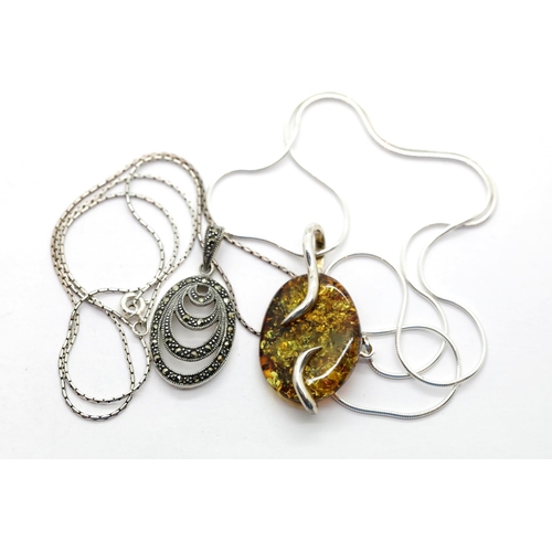 1659 - Two 925 silver pendants, one amber the other marcasite. P&P Group 1 (£14+VAT for the first lot and £... 