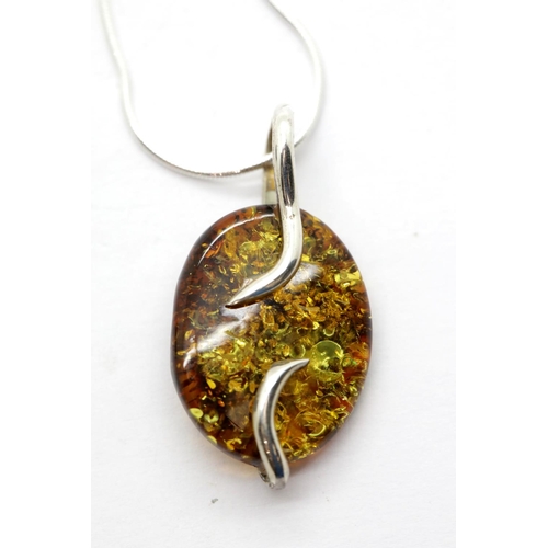 1659 - Two 925 silver pendants, one amber the other marcasite. P&P Group 1 (£14+VAT for the first lot and £... 