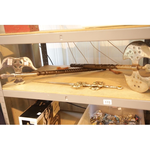 115 - Pair of wall hanging axes and two decorative daggers. This lot is not available for in-house P&P