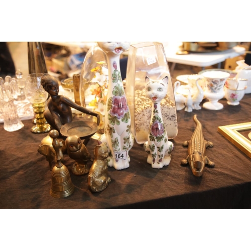 164 - Collection of glass, brass and ceramic figurines includes cats and crocodiles. This lot is not avail... 