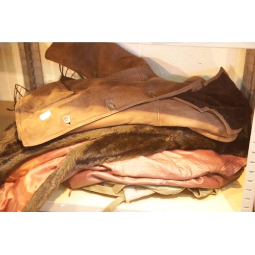 241 - Collection of ladies and gents jackets with a rucksack. P&P Group 3 (£25+VAT for the first lot and £... 