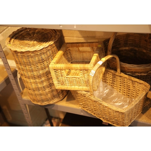 251 - Two wicker handled baskets plus a wicker lidded bin. This lot is not available for in-house P&P.