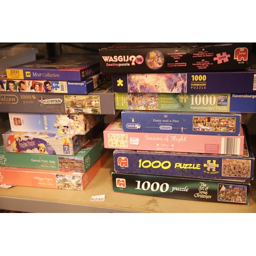 112 - Fourteen jigsaws of mixed ages to include Wasgij and Jumbo. This lot is not available for in-house P... 