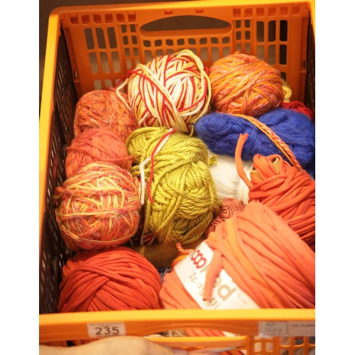 235 - Box of assorted knitting wool and roll of hooked zpagetti for giant knitting or crochet. P&P Group 2... 