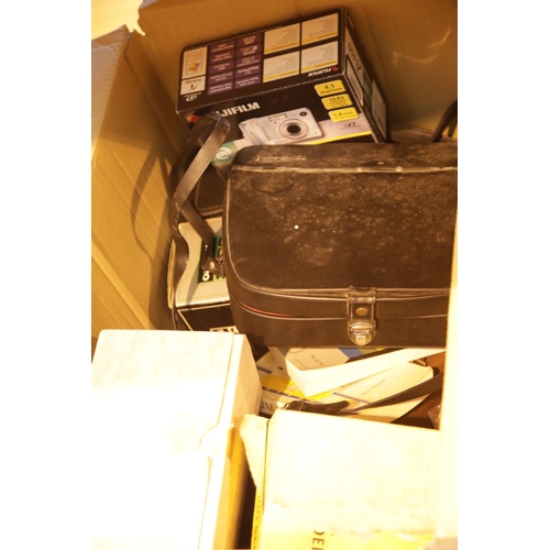 277 - Box of vintage cameras and equipment including Olympus, Polaroid, box brownie etc. This lot is not a... 