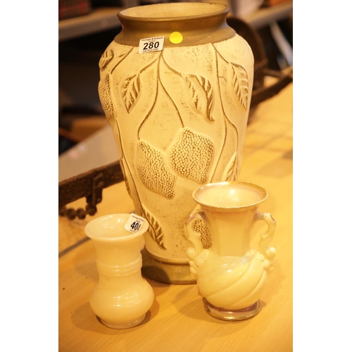 280 - Three vases including an alabaster example. This lot is not available for in-house P&P