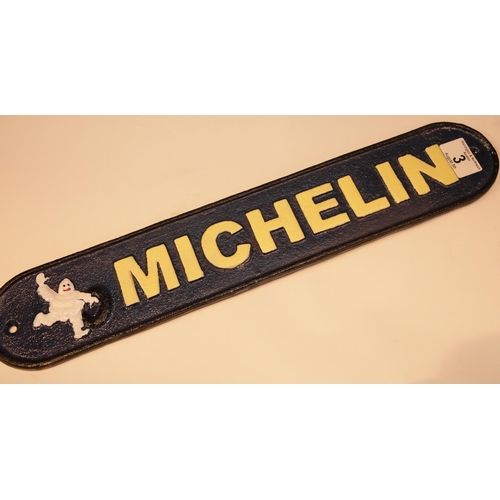 3 - Cast iron Michelin sign, 48 x 9 cm. P&P Group 2 (£18+VAT for the first lot and £2+VAT for subsequent... 