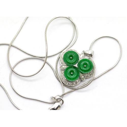 1128 - 18ct white gold diamond and jade set pendant on an 18ct white gold chain, L: 43 cm, 8.3g pendant siz... 