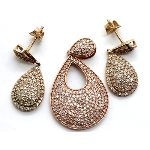 1133 - 9ct rose gold suite of jewellery, comprising a diamond set teardrop pendant and a pair of earrings, ... 