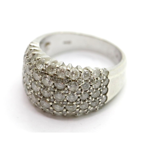1137 - 9ct white gold multi diamond set ring, size O, 9.1g. P&P Group 1 (£14+VAT for the first lot and £1+V... 