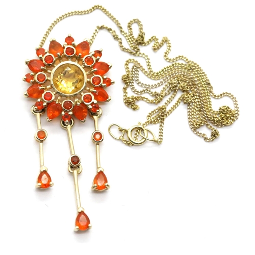 1131 - 9ct gold citrine and orange quartz drop pendant on a 9ct gold chain, L: 41 cm, 4.7g. P&P Group 1 (£1... 