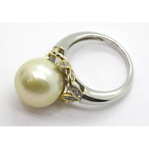 1144 - Silver diamond and pearl set ring, size N 6g. P&P Group 1 (£14+VAT for the first lot and £1+VAT for ... 