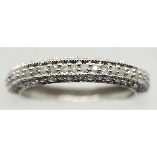 1155 - 9ct white gold diamond set half eternity ring, size P/Q, 2.2g. P&P Group 1 (£14+VAT for the first lo... 