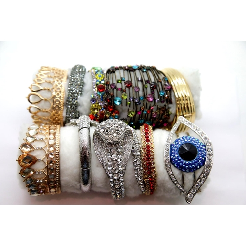 1246 - Ten mixed bangles including Butler and Wilson.  P&P Group 2 (£18+VAT for the first lot and £2+VAT fo... 