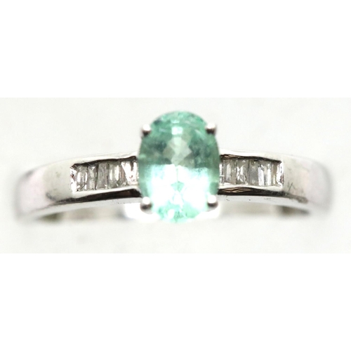 1168 - 9ct white gold diamond and green stone set ring, size O/P, 2.6g. P&P Group 1 (£14+VAT for the first ... 