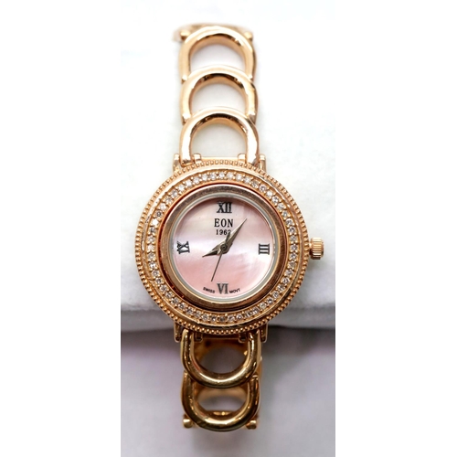 1249 - Boxed Eon 1962 ladies wristwatch with diamond studded bezel and two extra links.  P&P Group 1 (£14+V... 