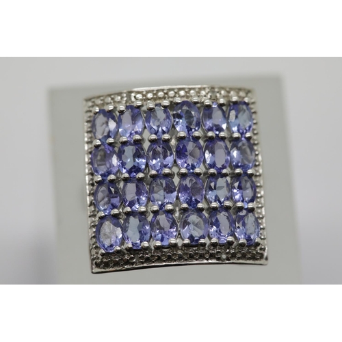 1297 - Silver ring set with amethysts and diamonds. Size O. 6.6g.  P&P Group 1 (£14+VAT for the first lot a... 