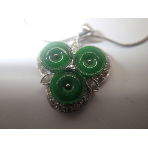 1128 - 18ct white gold diamond and jade set pendant on an 18ct white gold chain, L: 43 cm, 8.3g pendant siz... 