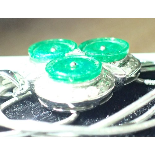 1128 - 18ct white gold diamond and jade set pendant on an 18ct white gold chain, L: 43 cm, 8.3g pendant siz... 