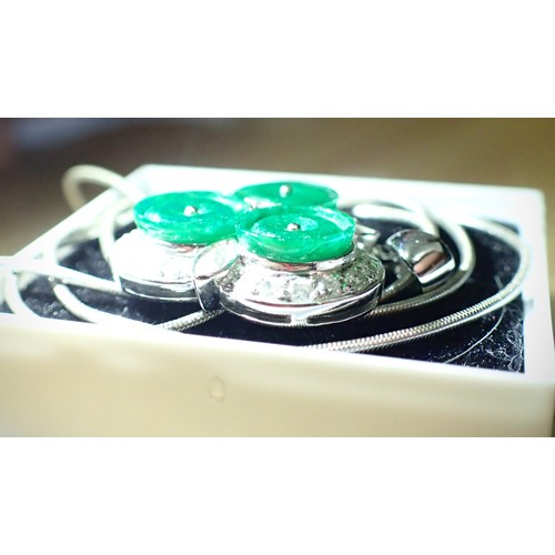 1128 - 18ct white gold diamond and jade set pendant on an 18ct white gold chain, L: 43 cm, 8.3g pendant siz... 