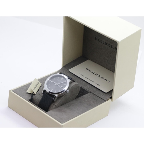 1200 - Boxed gents Burberry calendar wristwatch. P&P Group 1 (£14+VAT for the first lot and £1+VAT for subs... 