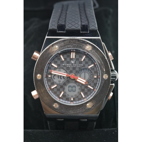 1204 - Boxed Michael Philippe mens wristwatch with black dial on black rubber strap. P&P Group 1 (£14+VAT f... 
