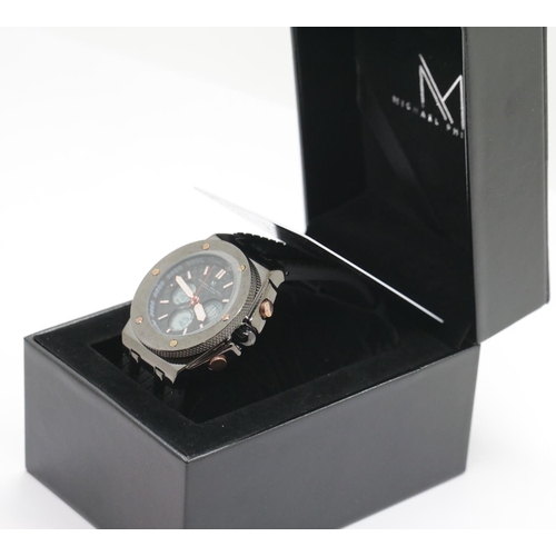 1204 - Boxed Michael Philippe mens wristwatch with black dial on black rubber strap. P&P Group 1 (£14+VAT f... 