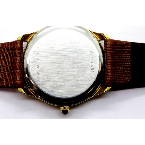 1053 - Longines gents mid-size gold plated quartz wristwatch on brown leather strap, D: 26 mm, requires bat... 