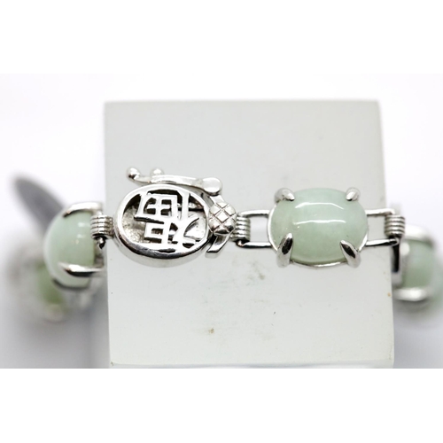 1158 - Ladies silver Chinese and jade fancy ornate bracelet. P&P Group 1 (£14+VAT for the first lot and £1+... 