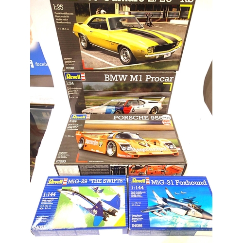 2314 - Five plastic kits; Revell 1:24 cars, Porsche 956, BMW m110 1:25 car, 69 Camaro Z 28 and a 1:144 MIG ... 