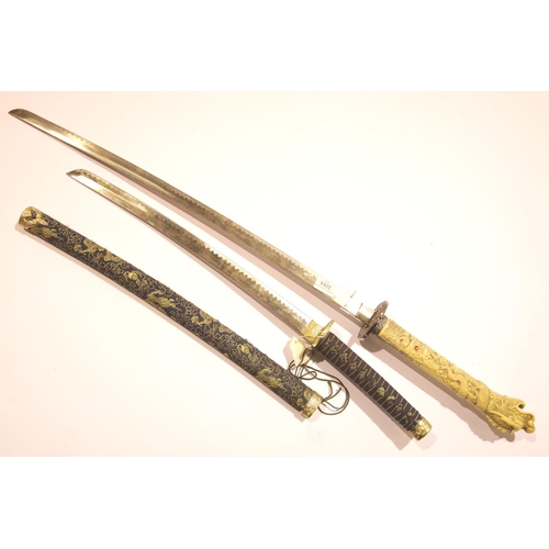 3264 - Two reproduction Japanese type swords. Not available for in-house P&P