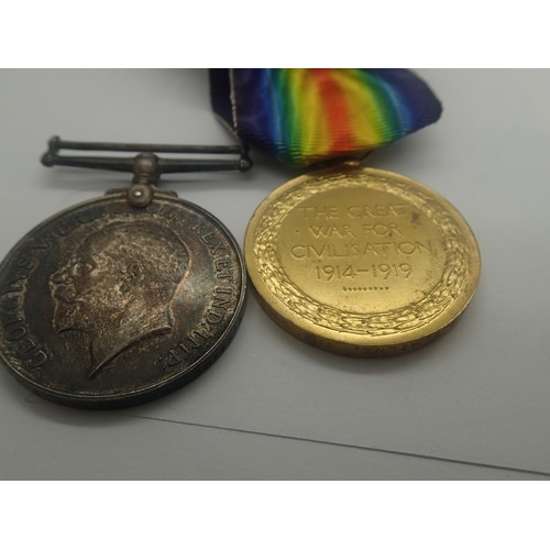 3534 - British WWI medal pair to 32231 Cpl J E Milne THE QUEEN'S R, wounded 1918 with original and facsimil... 