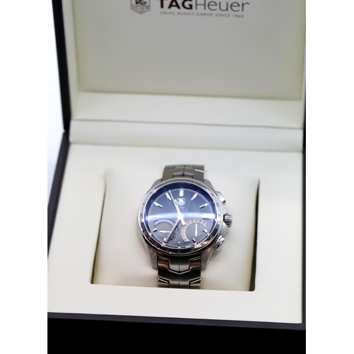 1066 - Gents Tag Heuer link Calibre S chronograph in box with quartz movement, model no CAT 7010, stainless... 