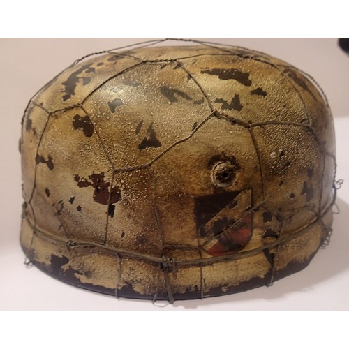 3180A - German Paratrooper WWII type helmet with double decal. Helmet, shell and liner are original, chin st... 