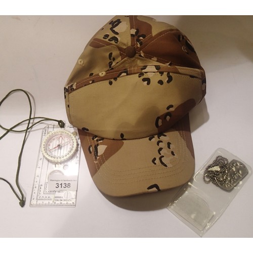 3138 - Mixed military items, to include camouflage hat, dog tags, and a field compass. P&P Group 1 (£14+VAT... 