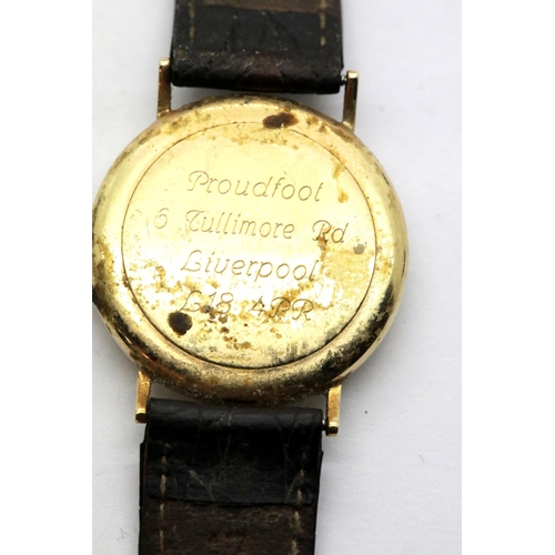 1025 - 9ct gold sovereign wristwatch on a leather strap, verso lightly engraved, working at lotting, dial D... 