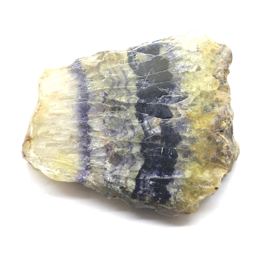 1043 - Piece of polished blue john, 4 x 3 cm, 22g. P&P Group 1 (£14+VAT for the first lot and £1+VAT for su... 