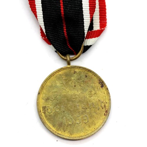 3452 - German WWII type War Merit medal with ribbon. P&P Group 1 (£14+VAT for the first lot and £1+VAT for ... 