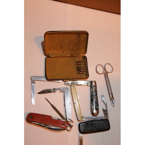 107 - 6 penknives and other items. P&P Group 1 (£14+VAT for the first lot and £1+VAT for subsequent lots)