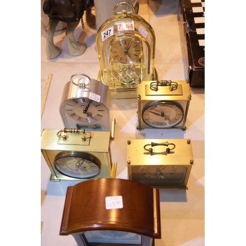 247 - Collection of six mantel clocks including mahogany break arch moon phase example. Not available for ... 