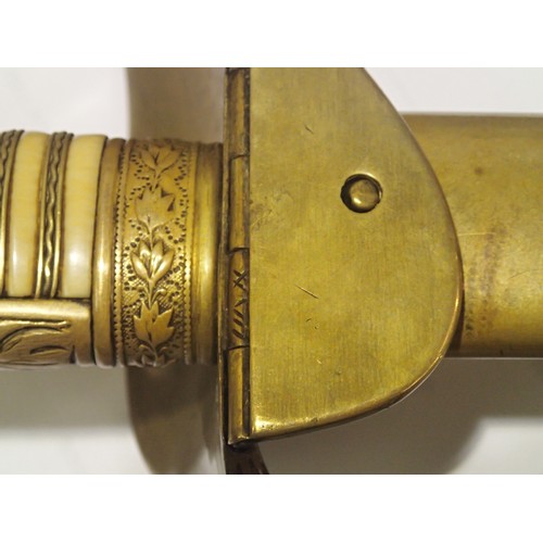 3250 - British 1898 pattern Naval Officer's sword and scabbard, gold wired ivory grip with brass knuckle gu... 