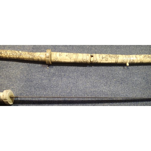 3272 - Heavily carved pair of late 19th century Japanese ivory Wakizashi swords. Both are complete but scab... 