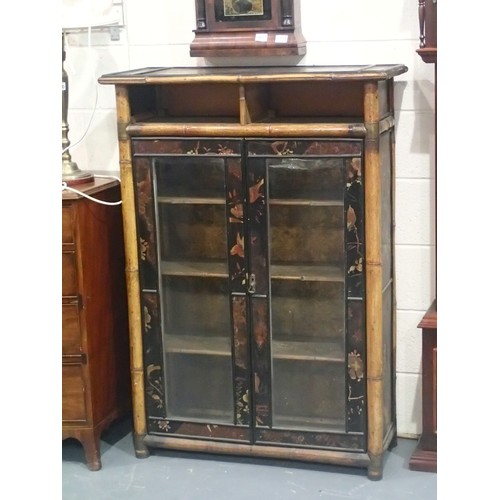 1768 - Late Regency period Chinoiserie lacquered two door glazed bookcase with bamboo frame, lacking drawer... 