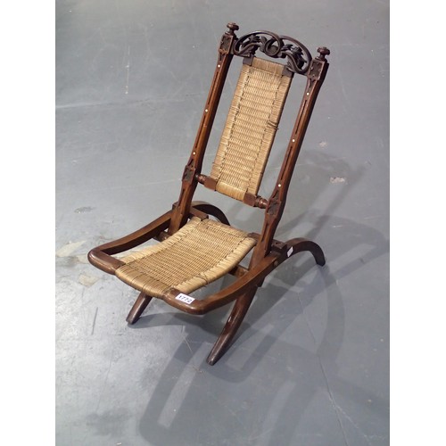 1772 - Victorian carved walnut folding picnic chair with woven canework seat and backrest. Not available fo... 