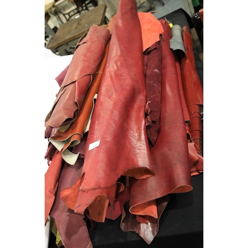 3220 - Quantity of rolled red leather. Not available for in-house P&P