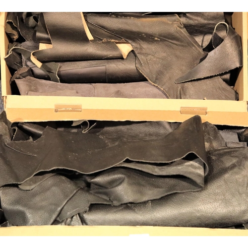 3041 - Two boxes of black leather pieces. P&P Group 3 (£25+VAT)