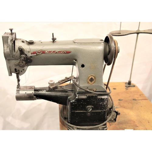 3117 - Vintage Seiko leather sewing machine, model CW8 on a treadle base with motor. Not available for in-h... 