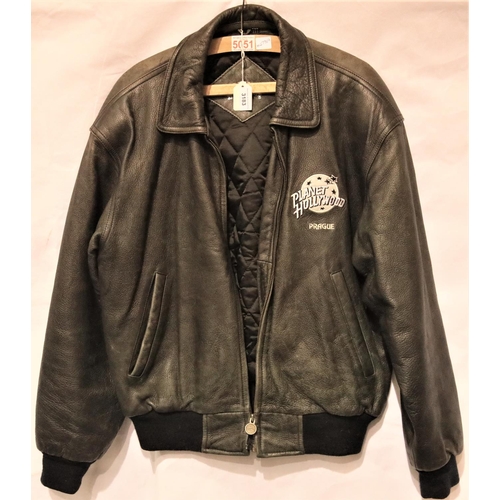 3183 - Planet Hollywood Prague small black leather biker jacket. P&P Group 3 (£25+VAT)