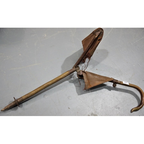 3209 - Early Grundigs leather shooting stick. P&P Group 3 (£25+VAT)