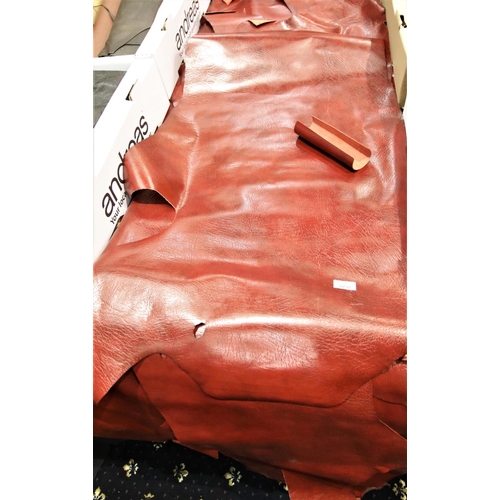 3232 - Quantity of red leather small hides and further red leather. Not available for in-house P&P